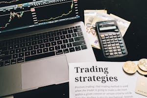 Research Paper on Trading Strategies Beside Calculator and Laptop